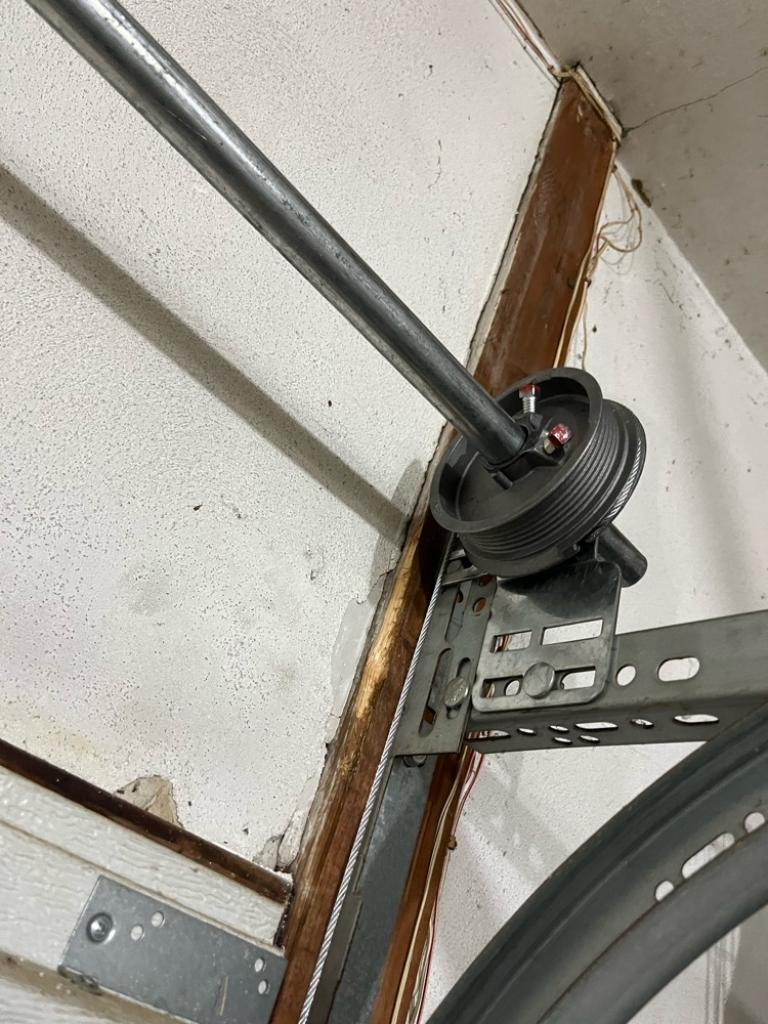 Garage Door Spring Installation garage door spring replacement broken torsion spring Garage Door Maintenance garage door repair Garage Door Maintenance Moline IL