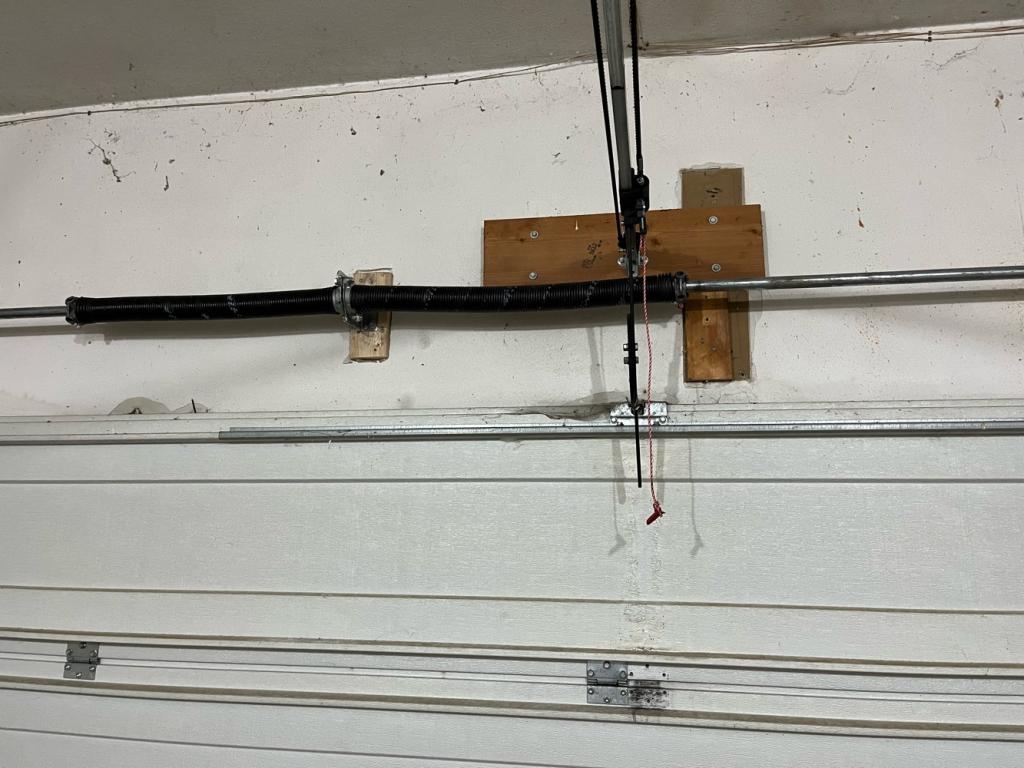 garage door repair Garage Door Spring Installation garage door spring replacement broken torsion spring Garage Door Maintenance Garage Door Maintenance Moline IL
