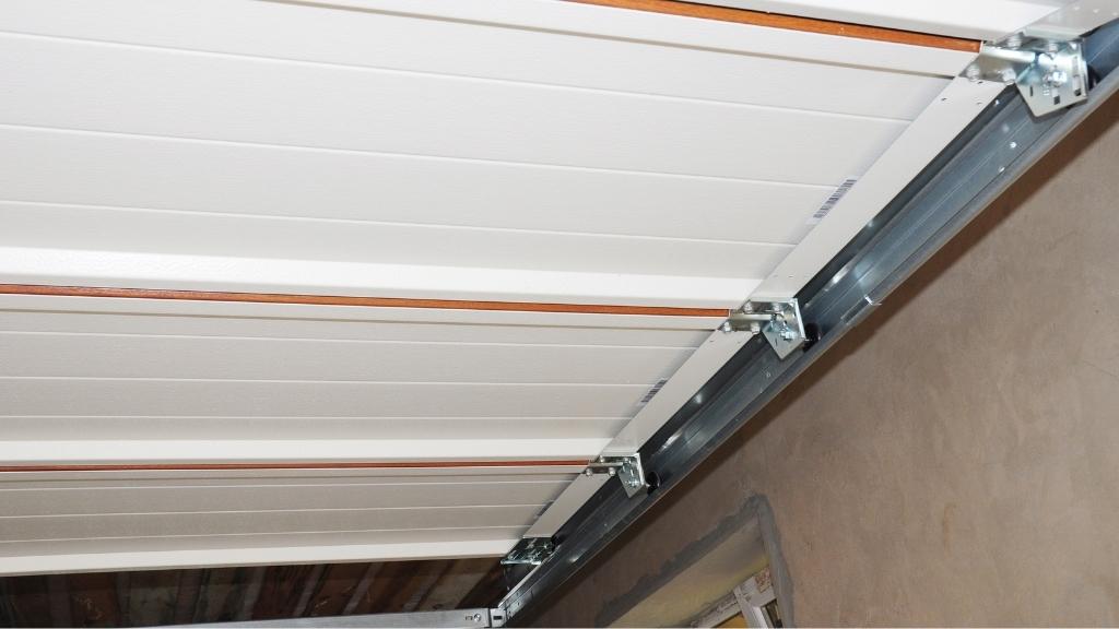 garage door replace The Importance of Repairing Your Garage Door Tracks!