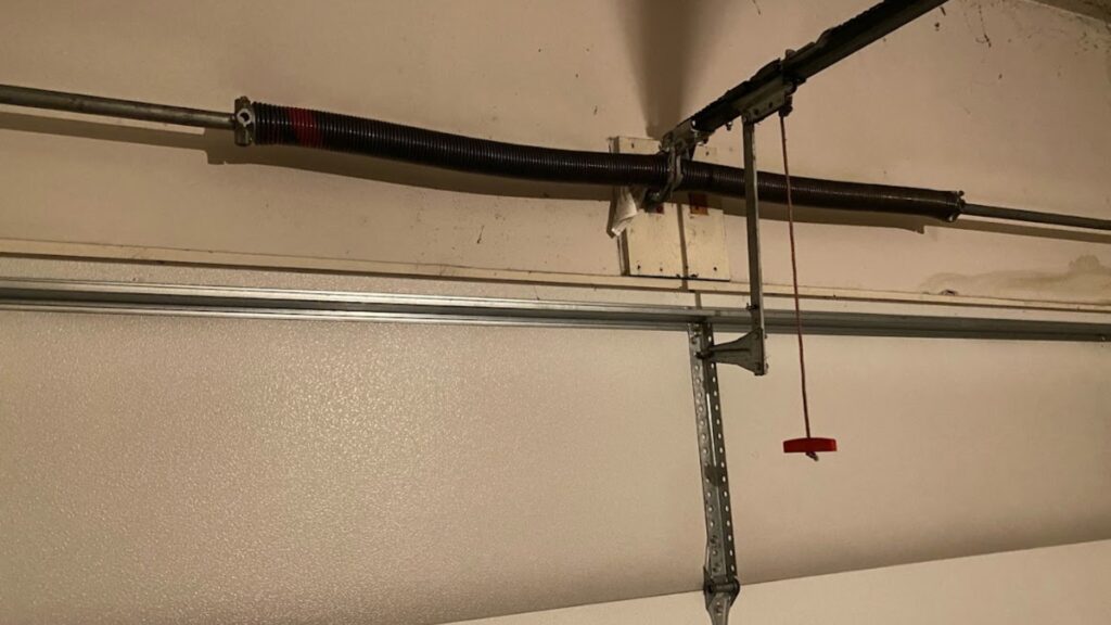 garage spring replacement Garage-Door-Spring-Moline-IL-Titan-Garage-Doors-Quad-Cities-Benefits-of-Using-Two-Torsion-Springs-for-Your-Garage-Door