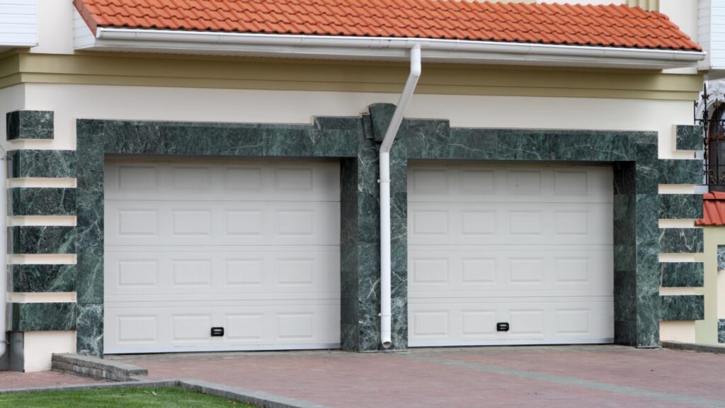 Tips for Protecting Garage Doors From Extreme Weather (2) Replacing Garage Doors With More Robust Ones