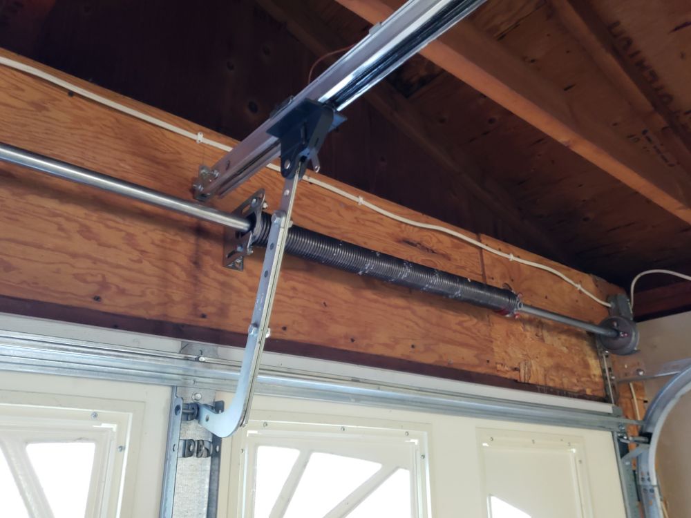 Garage Door Maintenance Garage Door Repair garage door sprin Garage Door Maintenance East Moline