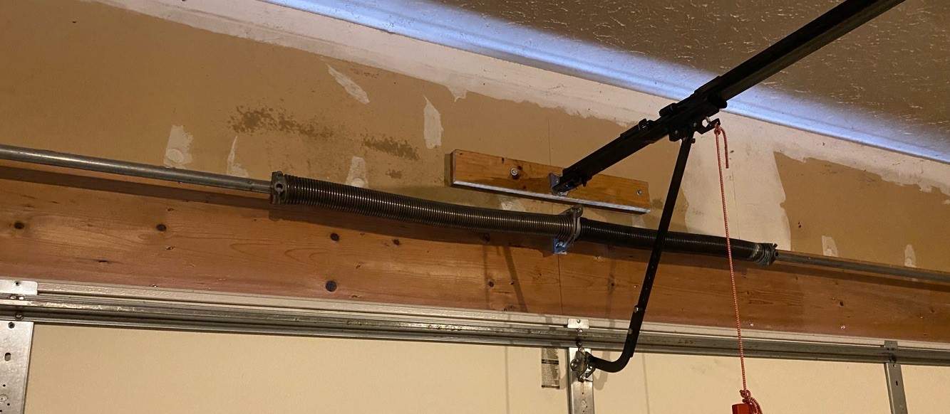 garage door repair garage door service garage door spring replacement broken torsion spring Garage Door Maintenance Garage Door Spring Replacement Bettendorf