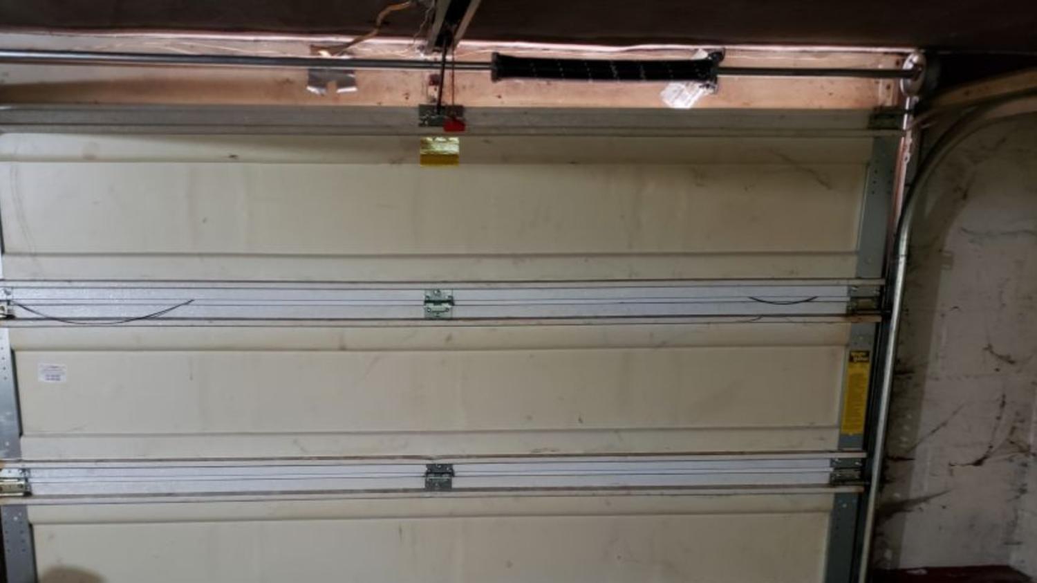 Garage Door Maintenance garage door repair garage door service garage door spring replacement broken torsion spring Residential Garage Door Spring Replacement Bettendorf