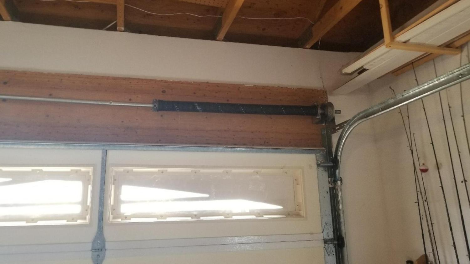 new springs for garage door broken torsion spring garage door repair garage door repair near me garage door service Garage Door Repair Northhaven Rd, Davenport, IA