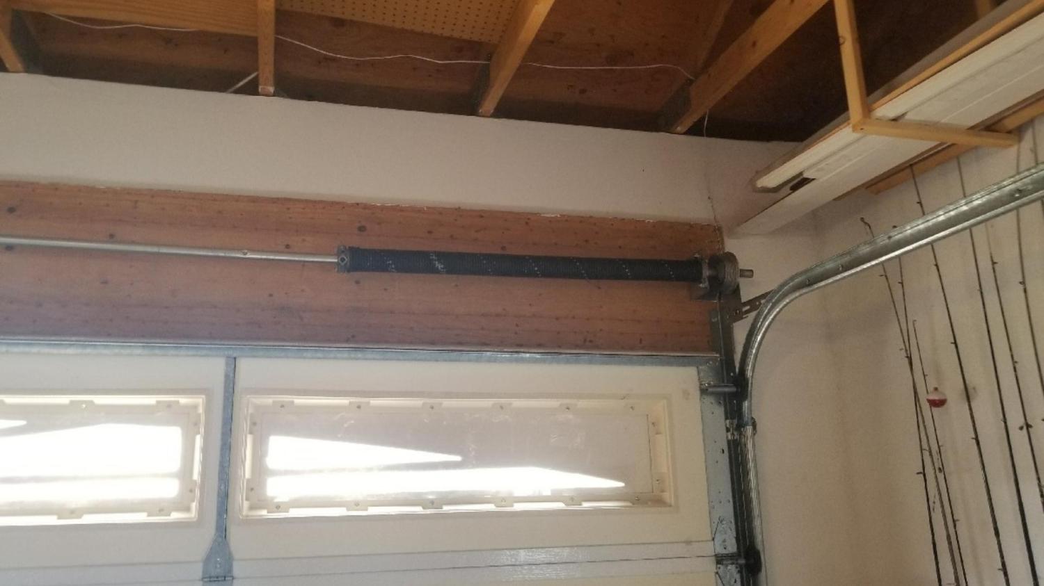 broken torsion spring garage door repair garage door repair near me garage door service new springs for garage door Garage Door Repair Northhaven Rd, Davenport, IA